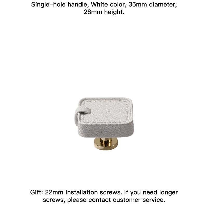 White square decorative leather drawer pull with gold base.